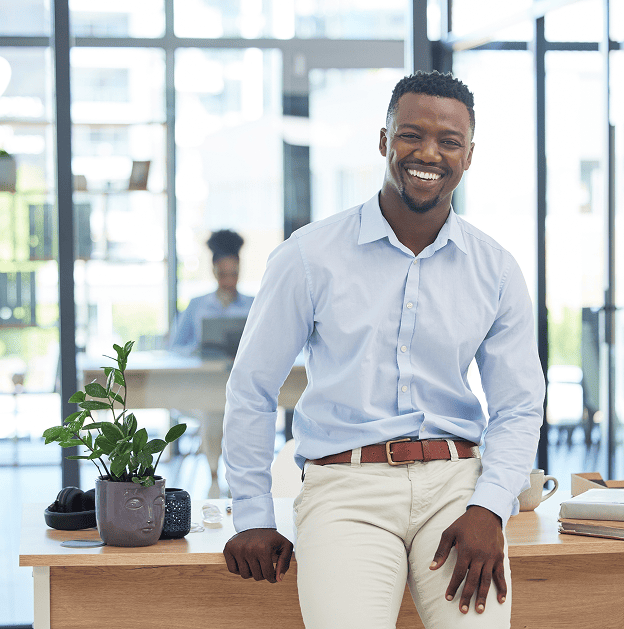 Sudatel colleagues standing together at sunset