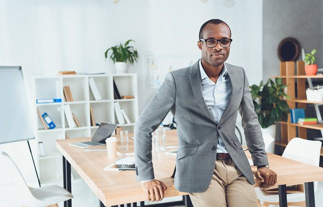 Sudatel employees standing together, representing graduates and young talent
